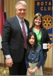 Rotary Club President David Lowe thanks Emily Crabtree and her mother, Tara, for attending the meeting.