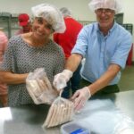 Marilyn and Gary Upton of Columbia Northwest volunteer at the food bank.