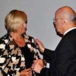 Melvin Platt congratulates District Governor Elect Susan Haralson